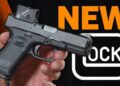 Glock Gen6 COA empunhada, com red dot Aimpoint COA integrado de fábrica