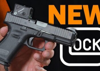 Glock Gen6 COA empunhada, com red dot Aimpoint COA integrado de fábrica