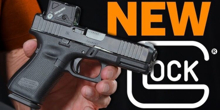 Glock Gen6 COA empunhada, com red dot Aimpoint COA integrado de fábrica